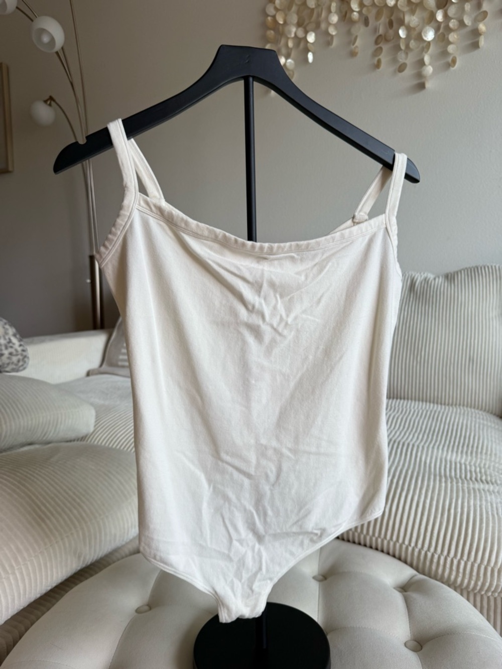 skims white bodysuit